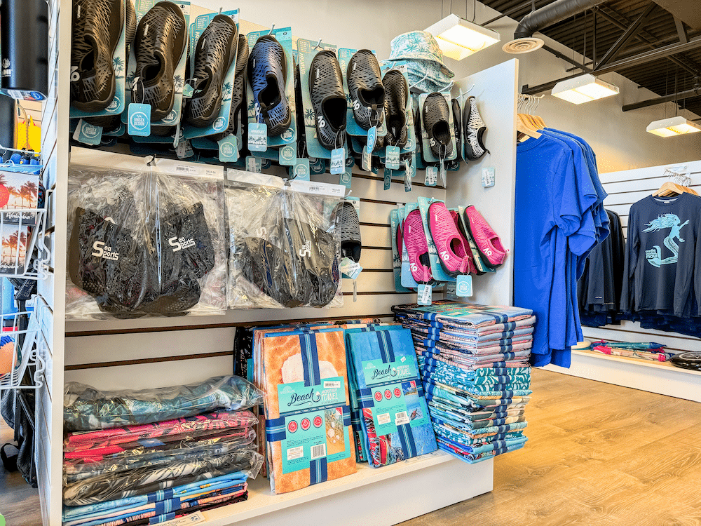 Water shoes, beach towels, and swim shirts at Auntie Snorkel