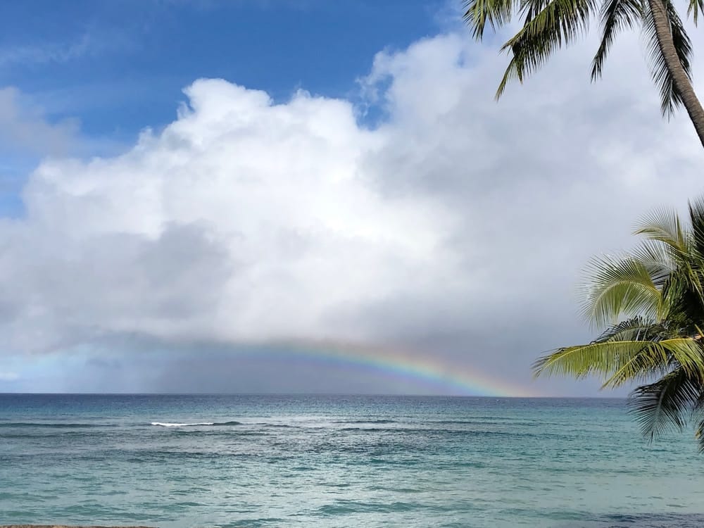 Rainbow and rain off the coast of Maui